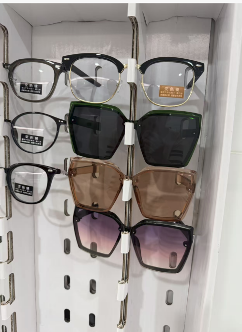 Physical photos of the first version of the sunglasses display stand for the client.